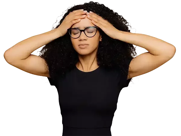Woman experiencing headache after computer work in downtown Toronto office environment