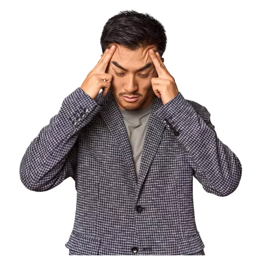 Person experiencing headache and tension around the temples