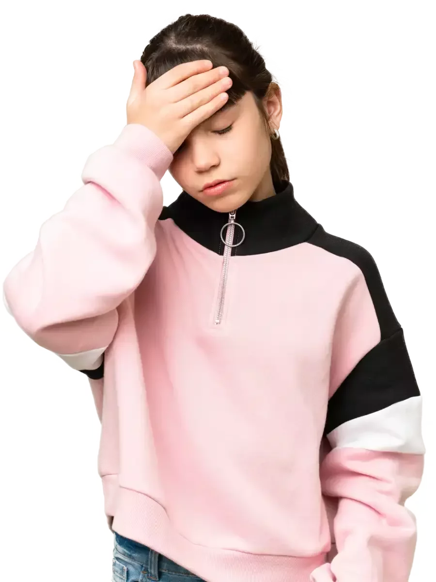 Young person experiencing recurring headache symptoms