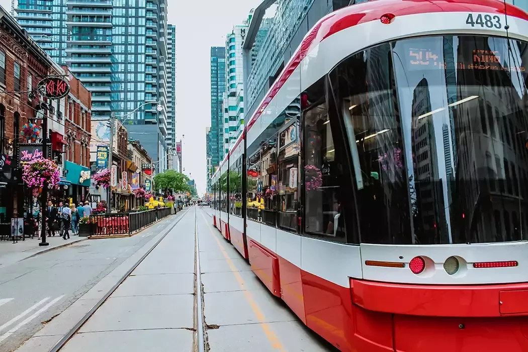 Close view of streetcar in downtown Toronto's entertainment district - King Street and John